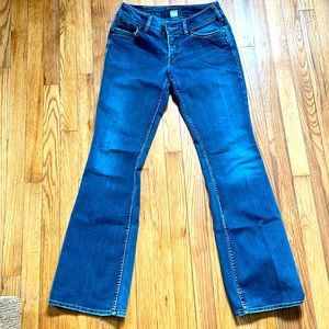 Good condition dark blue Jeans. Boot Cut